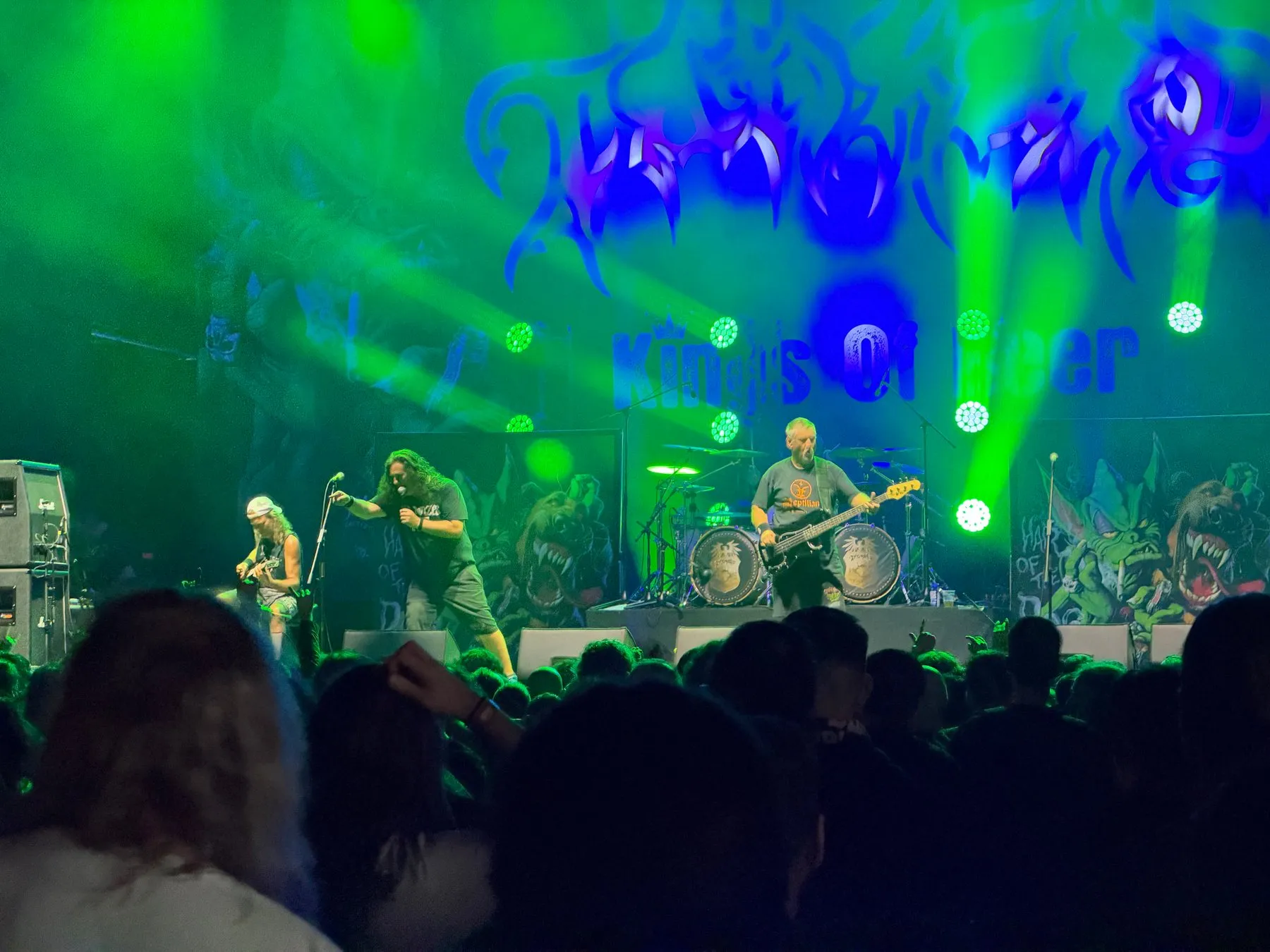 Tankard performing under green lights